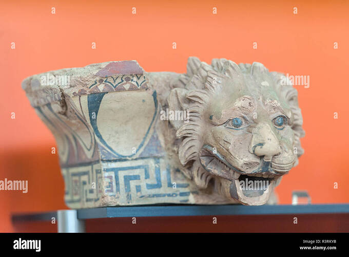 part-of-an-eave-trough-with-lion-head-water-spout-delphi-museum-delphi-greece-R3RKYB